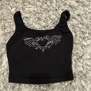 Black bedazzled heart tank top.
Worn once!🖤
